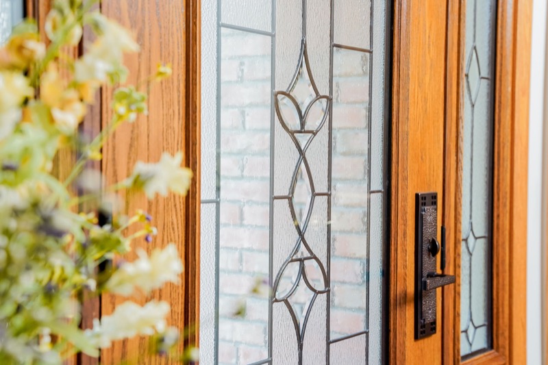 Wood-look fiberglass entry door with sidelites